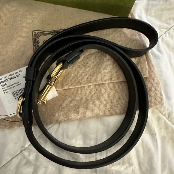 Gucci, black leather dog leash ￼  Leashes & Harnesses